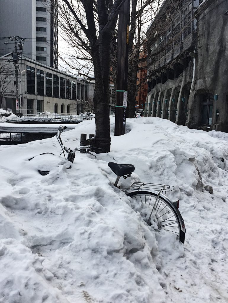 bike buried snow sapporo